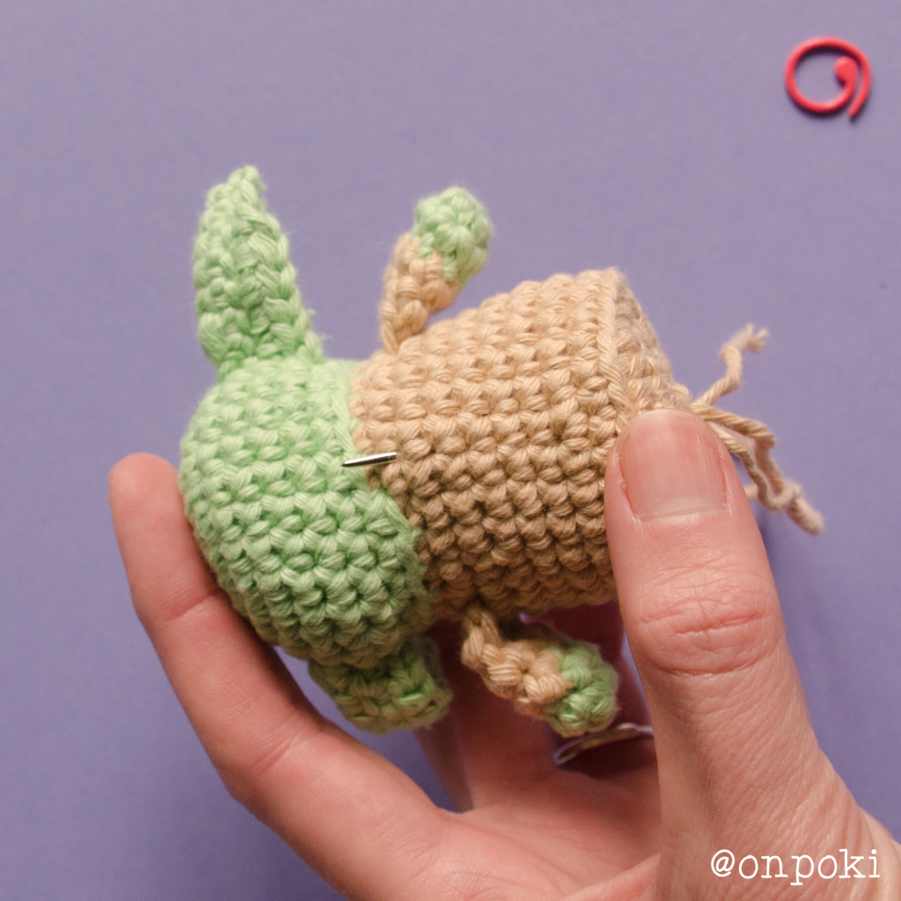 Needle coming out through Grogu’s base to lock the shape