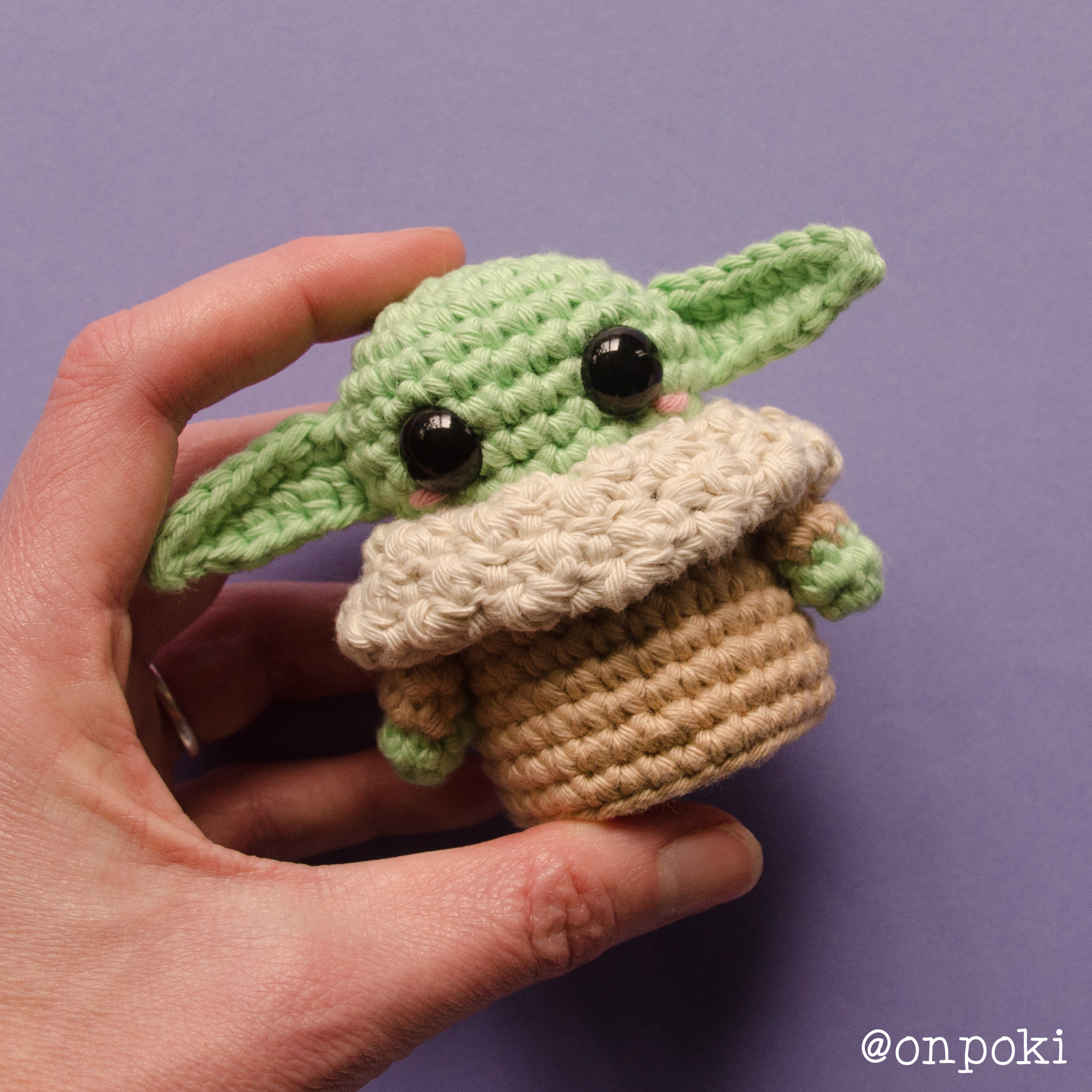 Front view of finished Grogu with blush and collar