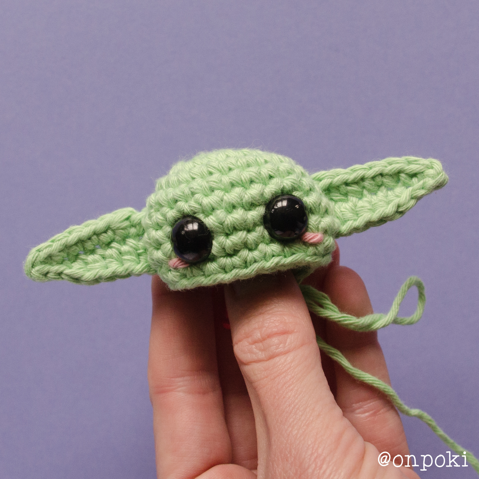 Finished Grogu head with ears attached and blush details